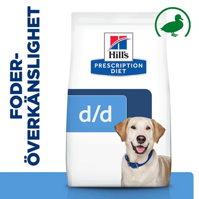 Hill's Prescription Diet d/d hundfoder, text: FODERÖVERKÄNSLIGHET, grön anka-symbol uppe till höger. Förpackning med blå och vit design. Hill's Prescription Diet d/d hundfoder, text: FODERÖVERKÄNSLIGHET, grön anka-symbol uppe till höger. Förpackning med blå och vit design.