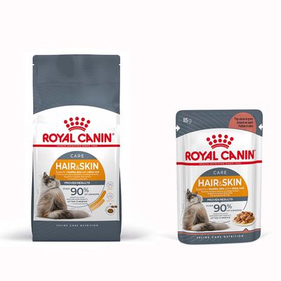 Royal Canin Feline Preference Savour Exigent oraz Royal Canin Instinctive 85 g. Opakowania karmy dla kotów, widoczne logo i znak procentowy oznaczający promocję.