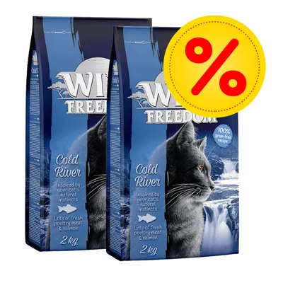 Wild Freedom Cold River kattenvoer, 2 zakken van 2 kg, tekst: '100% grain-free recipe', 'Lots of fresh poultry meat & salmon', kortingssymbool zichtbaar.