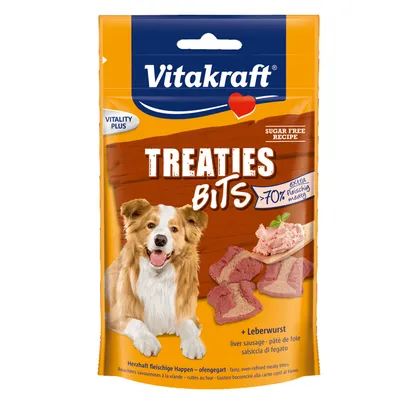 Vitakraft Treaties Bits, 70% extra meaty, без захар, пастет от черен дроб. Опаковка с изображение на куче и месни лакомства. Vitakraft Treaties Bits, 70% extra meaty, без захар, пастет от черен дроб. Опаковка с изображение на куче и месни лакомства.