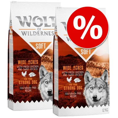 Wolf of Wilderness Soft Wide Acres hondenvoer, 12 kg zakken. Tekst: met verse kip en zoete aardappel, voor sterke hond, 100% graanvrij recept. Groot rood procentteken vooraan.