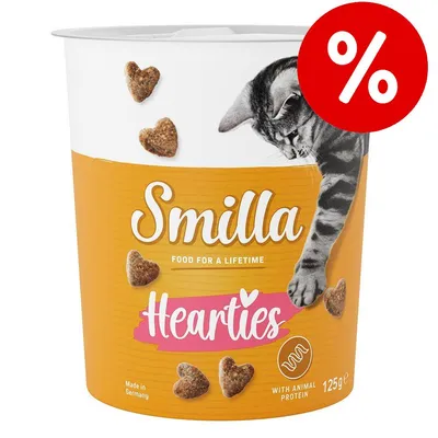 Smilla Hearties kattgodis, 125 g burk med hjärtformade bitar. Text: Food for a lifetime, with animal protein, Made in Germany. Röd rabatt-symbol med procenttecken.