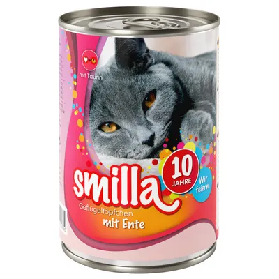 Lata de comida para gatos Smilla, texto visível: 'mit Taurin', 'smilla', '10 Jahre', 'Geflügeltöpfchen mit Ente', 'Wir feiern!'. Imagem de um gato cinzento na embalagem.