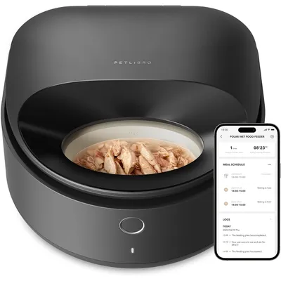 Automatic wet food feeder with a bowl of shredded meat and a smartphone displaying feeding schedule, meal times, and logs for managing feeding routines.