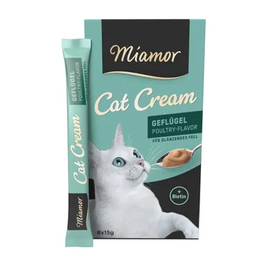 Miamor Cat Cream, saveur volaille, pour chat, boîte de 6×15g et un stick visible. Texte : Geflügel Poultry-Flavor, Für glänzendes Fell, + Biotin.