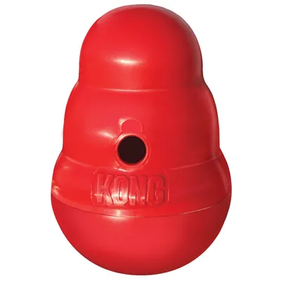 Rotes KONG-Spielzeug mit Öffnung, geeignet für Leckerlis oder interaktives Spielen. Markenname 'KONG' sichtbar auf der Oberfläche.