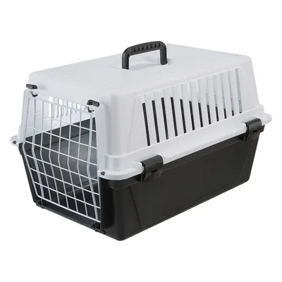 Caisse de transport en plastique blanc et noir avec porte grillagée en métal, poignée sur le dessus et aérations latérales visibles.