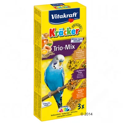 Vitakraft Kräcker Trio-Mix para periquitos, receta sin azúcar, con huevo y semillas de pasto, albaricoque e higo, miel y sésamo. 3 unidades. Imagen de un periquito azul en el envase.