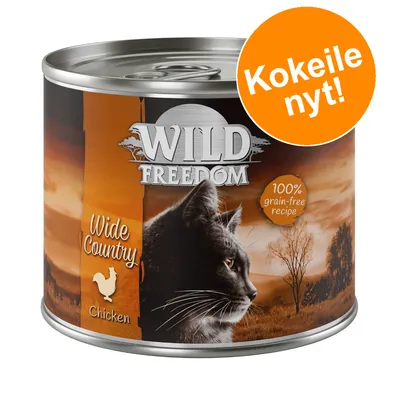 Wild Freedom Wide Country Chicken -kissanruokapurkki, 100% grain-free recipe, etiketti oranssi. Oranssi merkintä: Kokeile nyt!