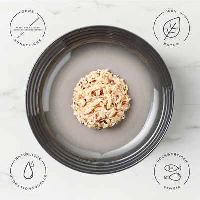 Encore In Broth Hähnchenbrustfilet mit Naturreis, 48x70g. 100% natürliche Zutaten. Verpackung zeigt Produkt und Katze.