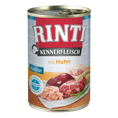 Rinti Kennerfleisch Junior kanaa, viljaton, lohiöljyllä, runsaasti omega-3:ta. Kuvassa lihapaloja ja sisäelimiä purkissa.