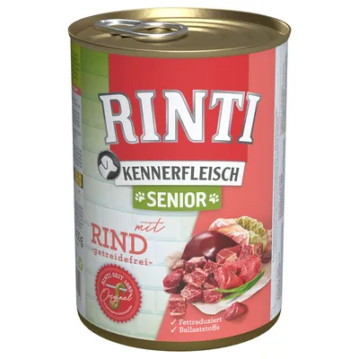 Lata de comida para perros Rinti Kennerfleisch Senior con ternera, sin cereales. Texto visible: 'Fettreduziert', 'Ballaststoffe', 'Original', imágenes de carne y verduras.