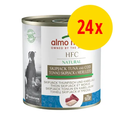 Lot de 24 boîtes Almo Nature HFC Natural thon skipjack et morue, mention sans gluten, texte multilingue sur l’étiquette, image d’un chien et morceaux de poisson visibles.