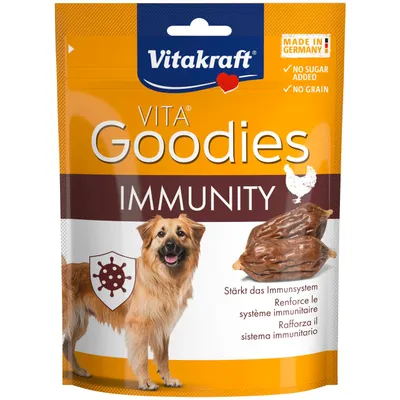 Vitakraft VITA Goodies Immunity, fremstillet i Tyskland, uden sukker, uden korn. Styrker immunforsvaret. Billede af hund og snack.