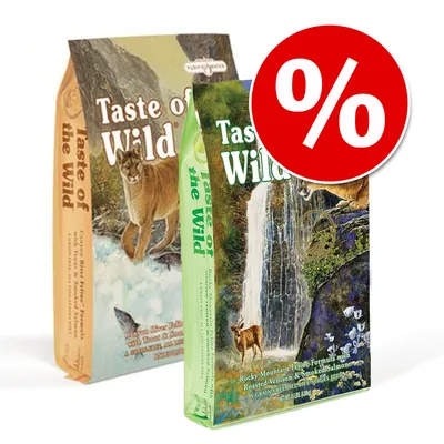 Dos sacos de pienso Taste of the Wild con imágenes de animales y naturaleza en el envase. Símbolo de porcentaje rojo indica oferta o descuento.