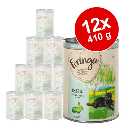Pack of 12 Feringa Rabbit with parsnips and catnip adult food cans, each 410g, shown in a pyramid arrangement with product details visible on the front can. Pack of 12 Feringa Rabbit with parsnips and catnip adult food cans, each 410g, shown in a pyramid arrangement with product details visible on the front can.