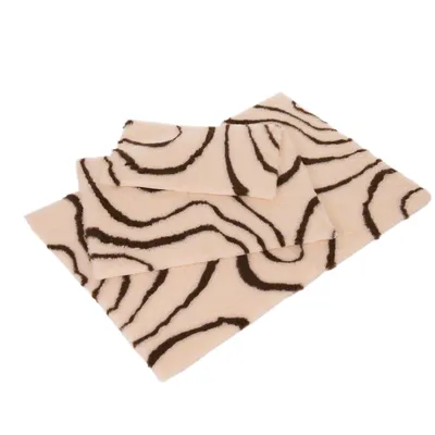 Soft beige blanket with brown zebra pattern, rectangular shape, suitable for various uses.