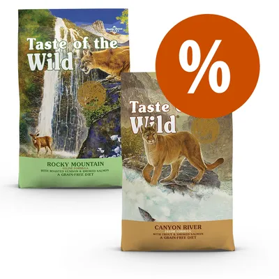 Due confezioni di Taste of the Wild per gatti: Rocky Mountain Feline Formula e Canyon River Feline Formula. Simbolo percentuale arancione indica offerta o sconto.