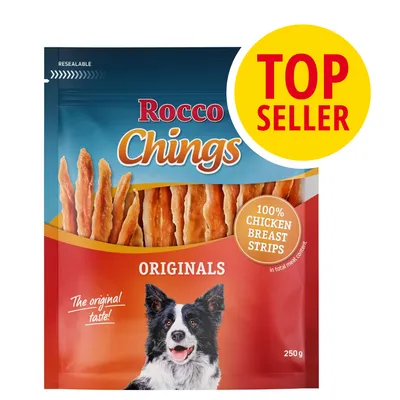 Rocco Chings Originals, tiras de pechuga de pollo 100 %, bolsa de 250 g. Etiqueta amarilla: TOP SELLER. Imagen de perro en el envase.