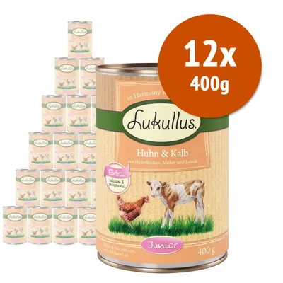 Lukullus Huhn & Kalb Junior, 12x400g. Testo visibile: Extra calcium & phosphorus, mit Haferflocken, Möhre und Leinöl. Immagine di lattina con pollo e vitello.