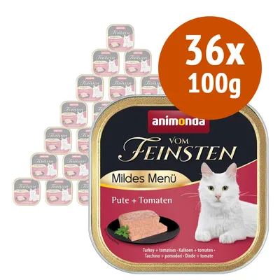 Animonda Vom Feinsten Mildes Menü Pute + Tomaten, confezione da 36 vaschette da 100 g. Immagine di un gatto bianco e paté su piatto nero. Testo visibile: tacchino + pomodori.