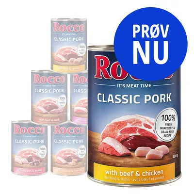 Rocco Classic Pork dåsefoder, synlige varianter: with beef & chicken, with beef & lamb, with chicken & turkey, with chicken & salmon. Tekst: 100% fresh ingredients & grain-free recipe, PRØV NU.