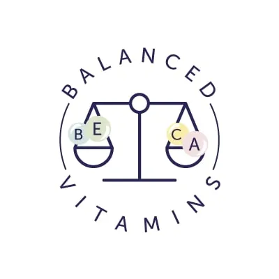 BALANCED VITAMINS with a scale holding BE and CA letters on coloured circles