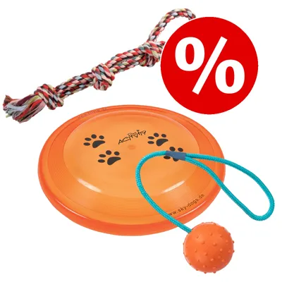 Lot de jouets pour chien : corde tressée multicolore, frisbee orange Dog Activity avec empreintes noires, balle orange à corde bleue. Symbole de réduction en haut à droite.