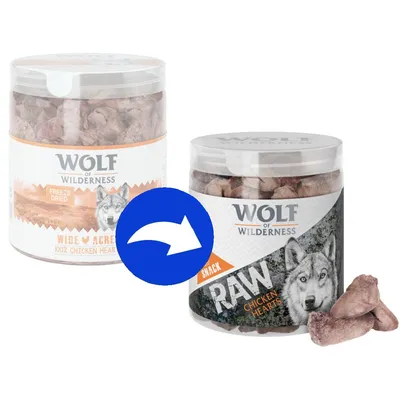 Wolf of Wilderness RAW Chicken Hearts Snack, Produktumstellung von Wide Acres 100% Chicken Hearts auf neue Verpackung mit blauem Pfeil.