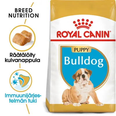 Royal Canin Puppy Bulldog -kuivaruokapakkaus, tekstit: Räätälöity kuivanappula, Immuunijärjestelmän tuki, kuva nappulasta ja bulldog-pennusta.