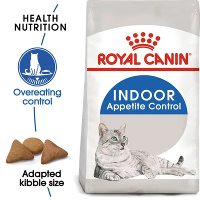 Royal Canin Indoor Appetite Control cat food pack with text: Health Nutrition, Overeating control, Adapted kibble size. Image of grey cat and three pieces of triangular kibble.