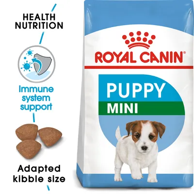 Royal Canin PUPPY MINI -koiranruokapakkaus, näkyvissä nappuloiden koko, tekstit: Health Nutrition, Immune system support, Adapted kibble size