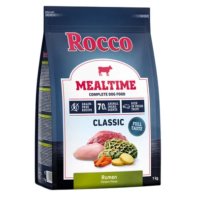 Rocco Mealtime Classic, graanvrij recept met 70% dierlijke ingrediënten, rijk aan verse pens. Verpakking toont stukjes vlees, groenten en aardappelen. Gewicht: 1 kg.