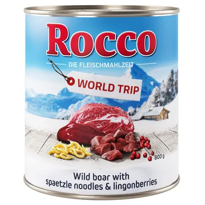 Lata de comida Rocco World Trip, 800 g. Texto visible: 'Wild boar with spaetzle noodles & lingonberries'. Imagen de carne, pasta y bayas en la etiqueta.