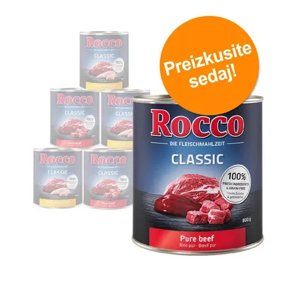 Rocco Classic Pure beef, 800 g konzerva. Na oranžnem krogu besedilo: Preizkusite sedaj! Vidne tudi druge različice Rocco Classic z mesom in piščancem.