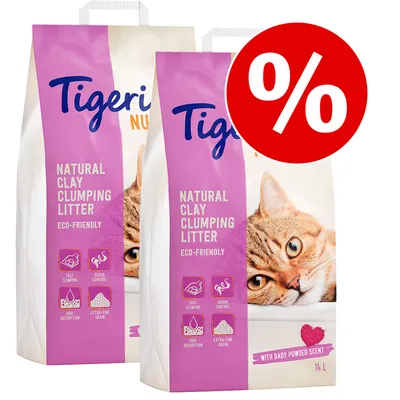 Twee zakken Tigerino Natural Clay Clumping Litter, eco-friendly, met baby powder scent, 14L. Tekst: fast clumping, odour control, high absorption, extra-fine grain. Rood kortingssymbool.