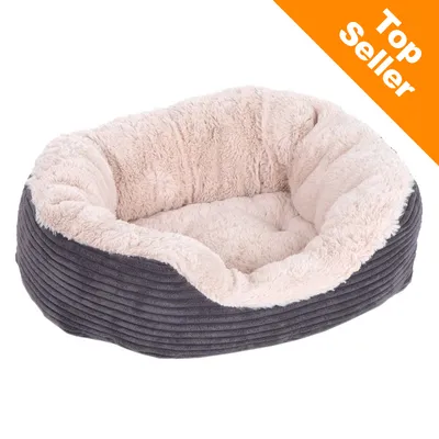 Rund husdjursbädd med beige mjuk insida och grå ribbad utsida. Orange hörn med vit text: Top Seller. Rund husdjursbädd med beige mjuk insida och grå ribbad utsida. Orange hörn med vit text: Top Seller.