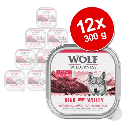 Wolf of Wilderness High Valley, pack de 12x300 g. Texto visible: 100% grain-free, beef with wild berries, roots and wild herbs. Imagen del envase frontal apilado.