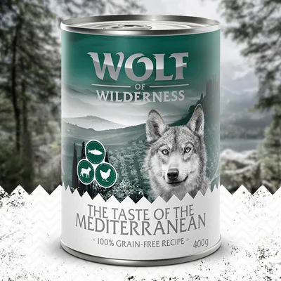 Wolf of Wilderness The Taste of the Mediterranean, 100% grain-free recipe, 400g. Boîte avec illustrations d’animaux et texte en anglais sur l’étiquette.