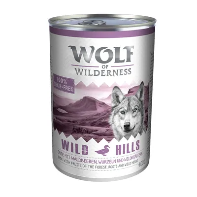 Wolf of Wilderness Wild Hills våtfoder, 100% grain-free, anka med skogsbär, rötter och vilda örter, burk 400 g. Text på engelska och tyska synlig på förpackningen.