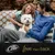 Cesar brand with slogan 'Love them back' shown below people sitting with a white dog on a sofa outdoors.