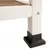 Pied de meuble en bois clair avec embout carré noir en plastique, fixation visible par vis métallique.