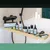kooa Dental Care Set and care products for pets on bamboo tray, including toothbrush, clipper and sprays.