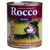 Blik Rocco Senior hondenvoer, 800 g, smaak Lamm & Hirse. Tekst: Moderater Fettgehalt. Pictogrammen: Ideales Ca/P, Leicht verdaulich, Kraft & Energie. Afbeelding van oudere hond op gras.