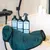 kooa Sensitive Shampoo, Deep-Cleansing Shampoo and Detangling Spray. Premium care brand for pets with bamboo tray and green towel.