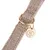 Close-up of a beige and white patterned collar with gold-coloured ring and pendant engraved with 'NT'.