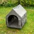 Outdoor-huisdierentent in beige met stevig metalen frame, rechthoekige ingang en waterafstotende stof. Geschikt voor tuin of buitenruimte.