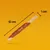 Dog chew stick, 12 cm long and 1 cm wide, shown against orange background with measurements labelled
