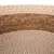 Gros plan sur un tressage en fibres naturelles et blanches, matériau visible d’un panier ou coussin pour animaux.
