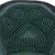 Close-up of a green rubber brush with paw-shaped studs, suitable for coat care.